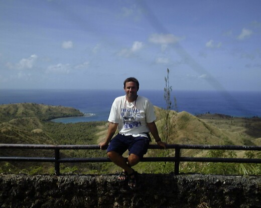 Chris at a scenic overlook in southern Guam, where dolphins frequent the bays