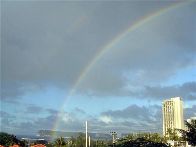 A double rainbow seen from the office, with Two Lover's Point in the background