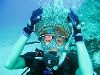 A girl with a sea cucumber hat 