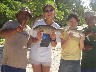 Yukiko & Sayaka admiring the catch by some Chamorro fishermen