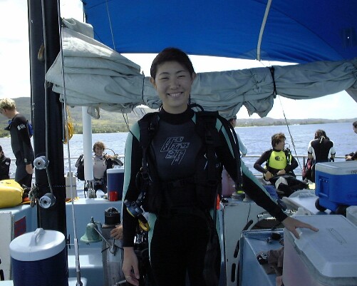 Yukiko with customers aboard the boat